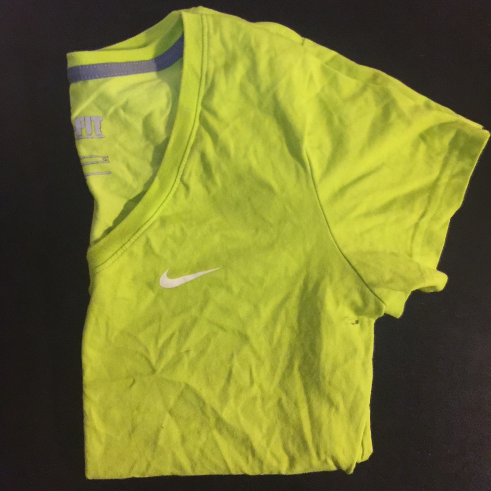 Yellow Nike Dri-Fit shirt